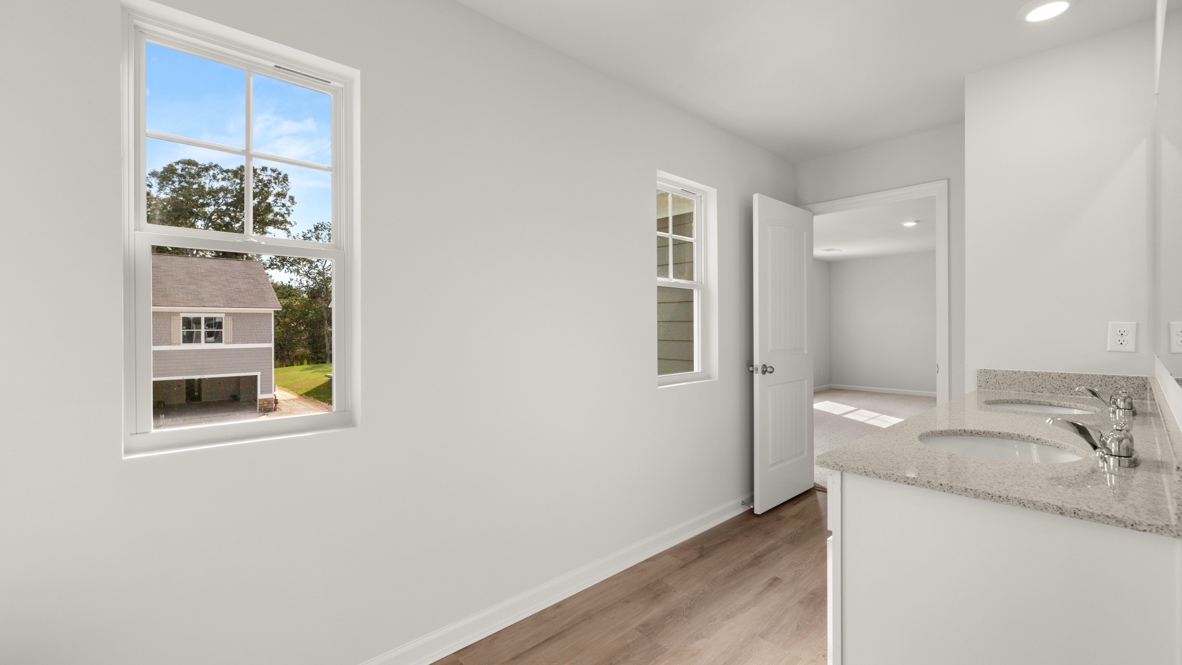 Interior primary bathroom with double sink