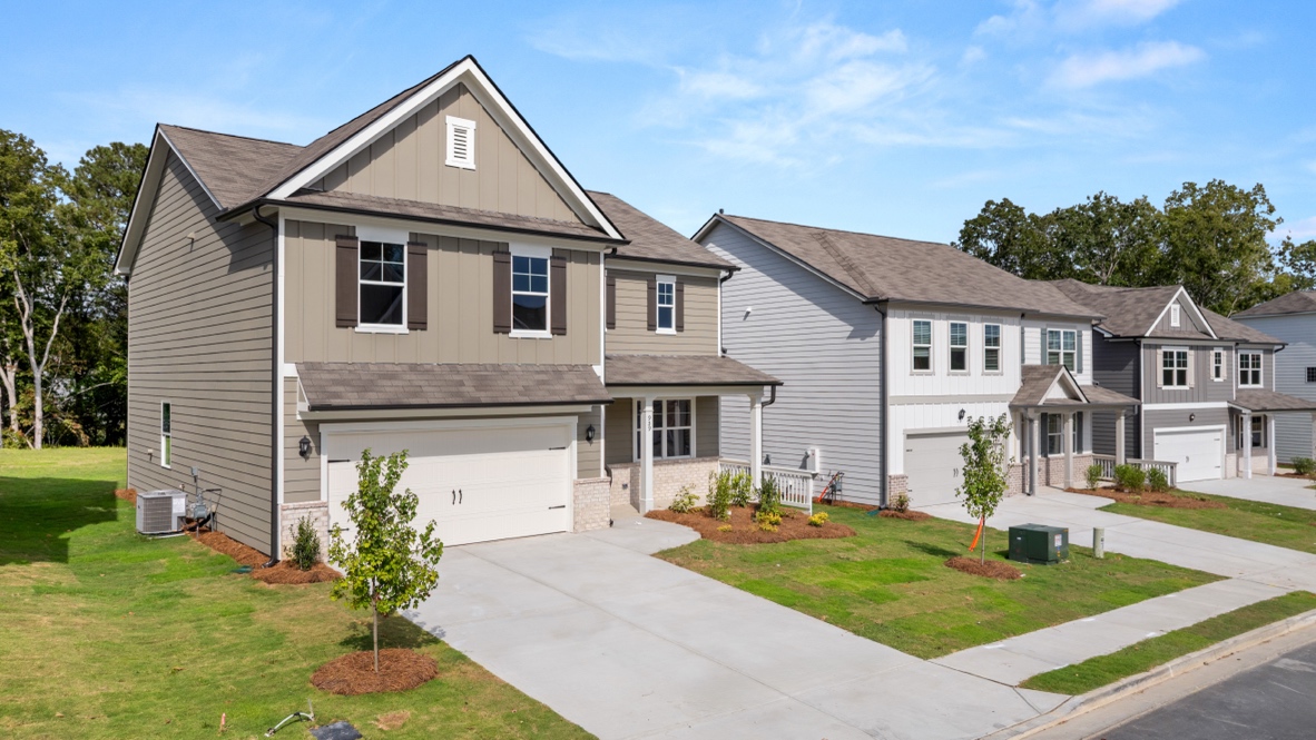 Exterior two-story homes with stone detailing