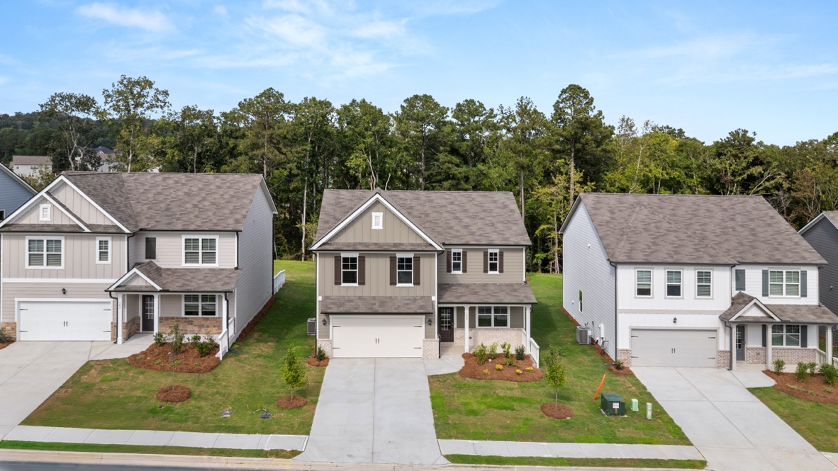 Exterior two-story homes with stone detailing