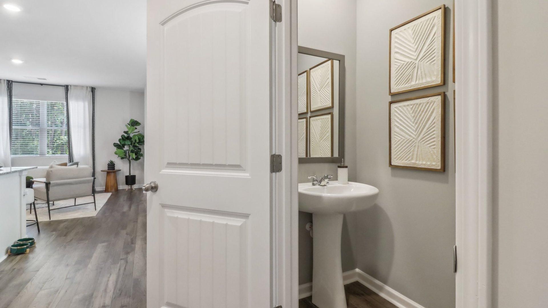 powder bathroom with a pedestal sink
