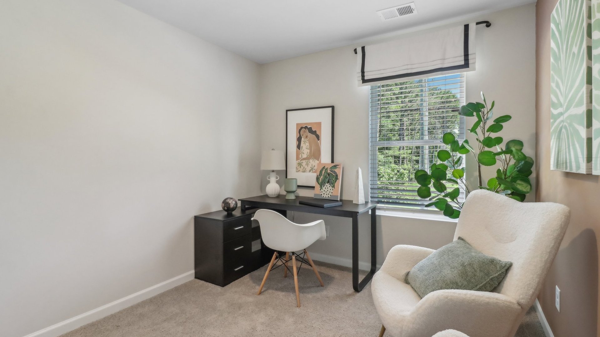 Interior office with dark orange accent wall and window