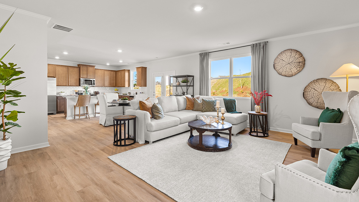 Living area with a double window and fireplace.