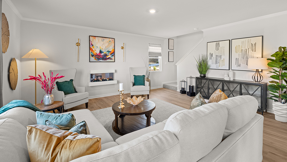 Living area with a double window and fireplace.