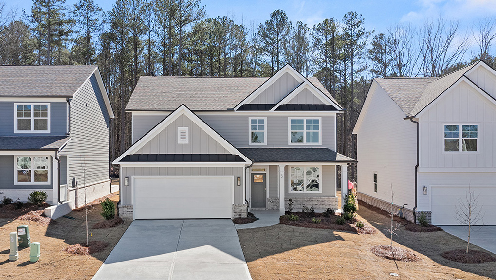 Front exterior of the Elle floorplan at Hamptons at Riverwood South in Dallas, GA