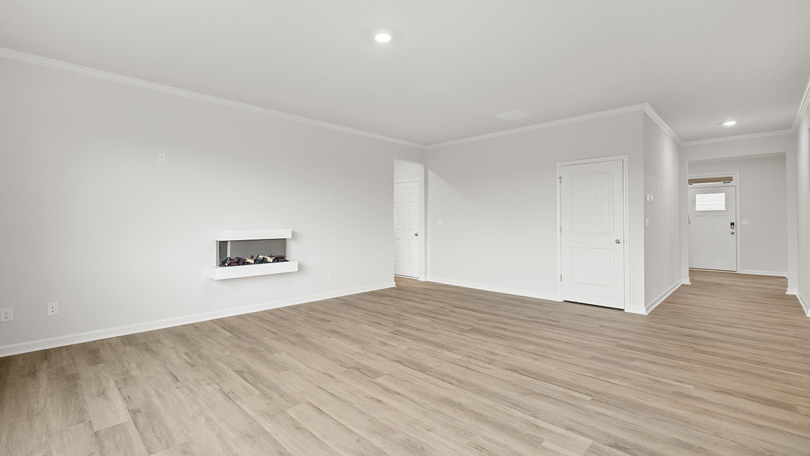 Interior living area with fire place and large windows