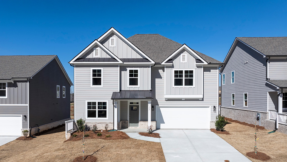 Front exterior of the Halton floorplan at Hamptons at Riverwood South in Dallas, GA