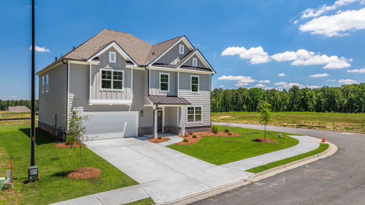 Front exterior of the Halton floorplan at Hamptons at Riverwood South in Dallas, GA