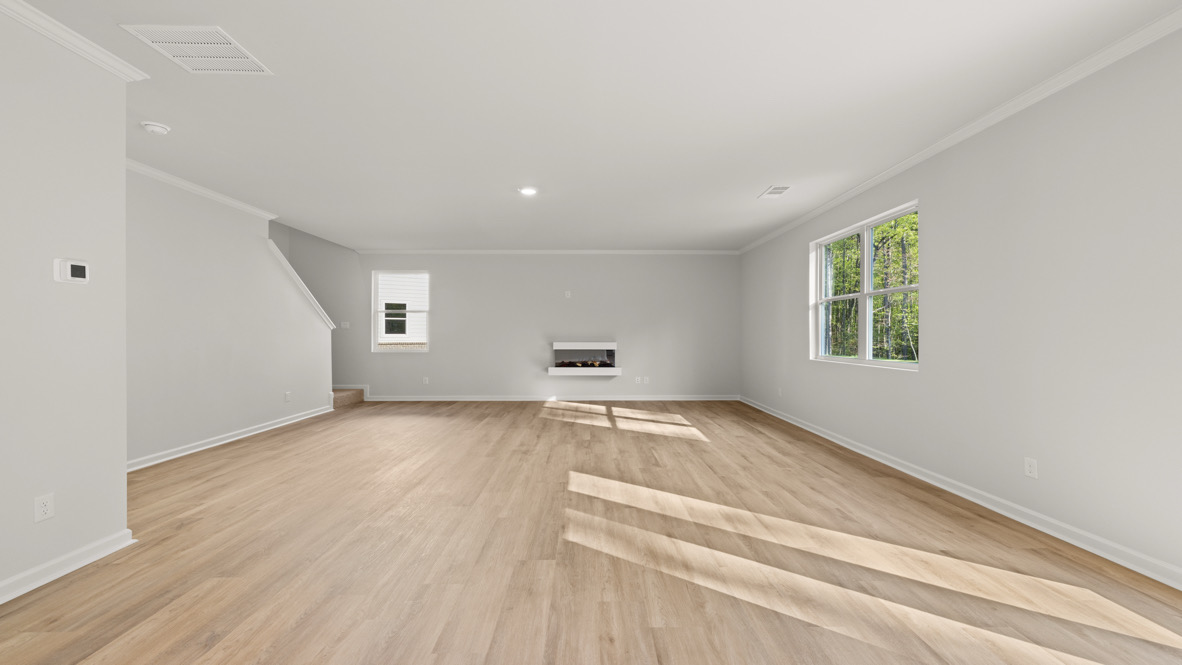 Interior living area with large windows and fire place
