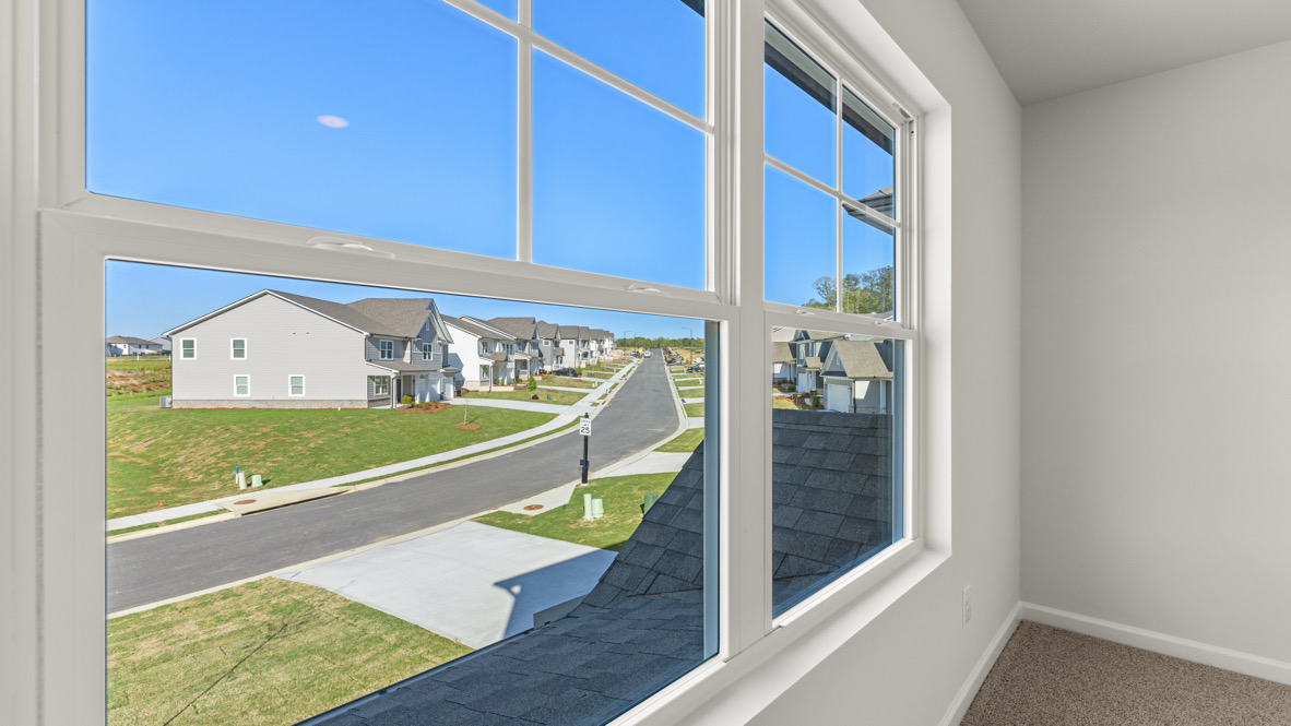 Interior bedroom with large windows