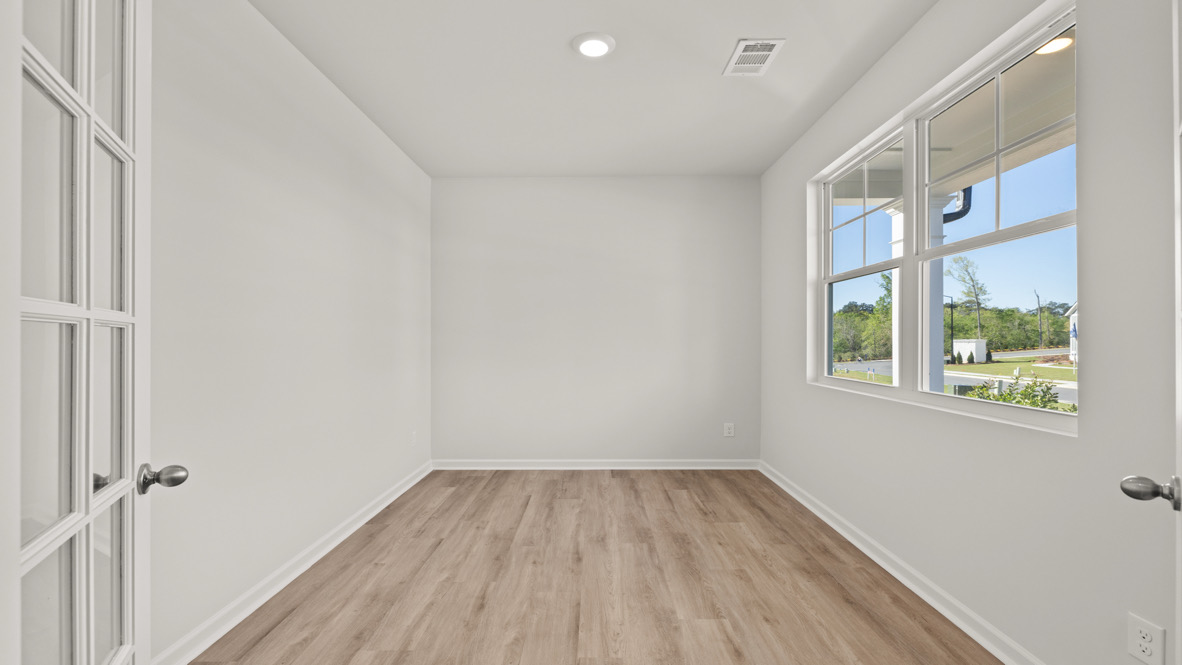 Interior flex room with large window