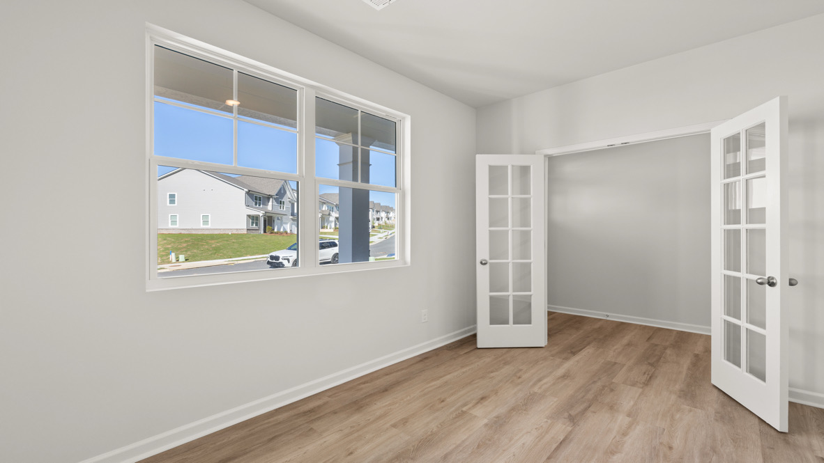 Interior flex room with large window