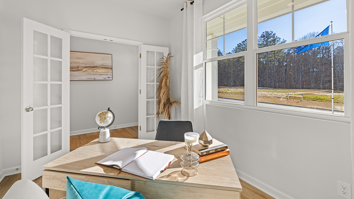 Interior office with large window next to hallway