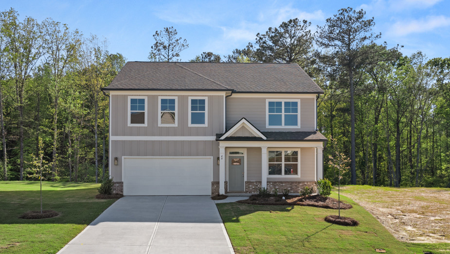 Front exterior of the Hanover floorplan at Hamptons at Riverwood South in Dallas, GA