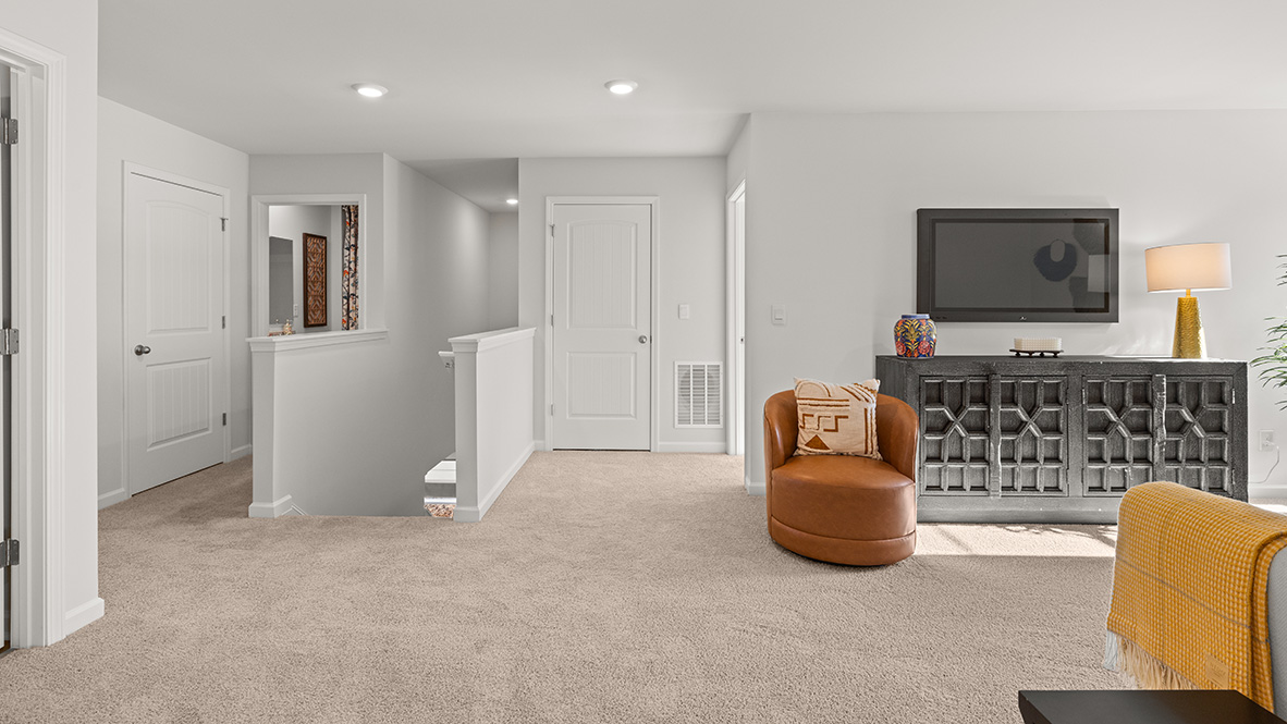 Interior upstairs loft area next to staircase