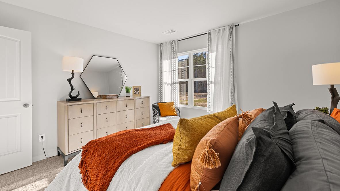 Interior upstairs bedroom with window