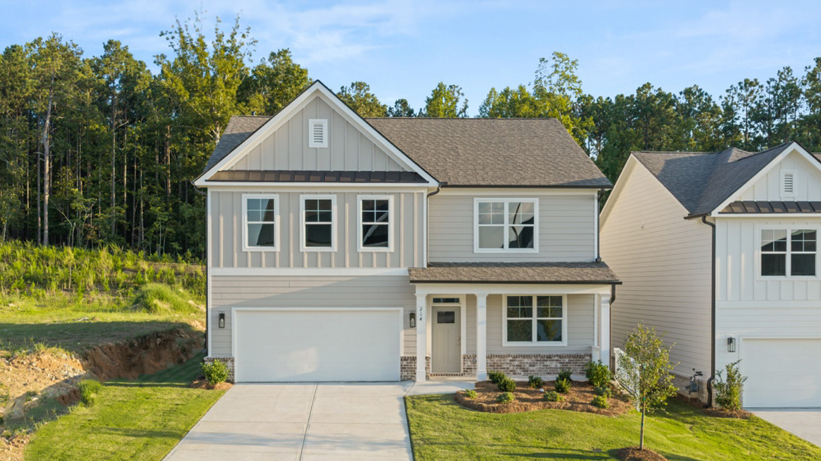 Front exterior of the Hanover floorplan at Hamptons at Riverwood South in Dallas, GA