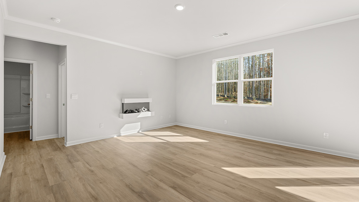 Interior living area with fire place and large windows