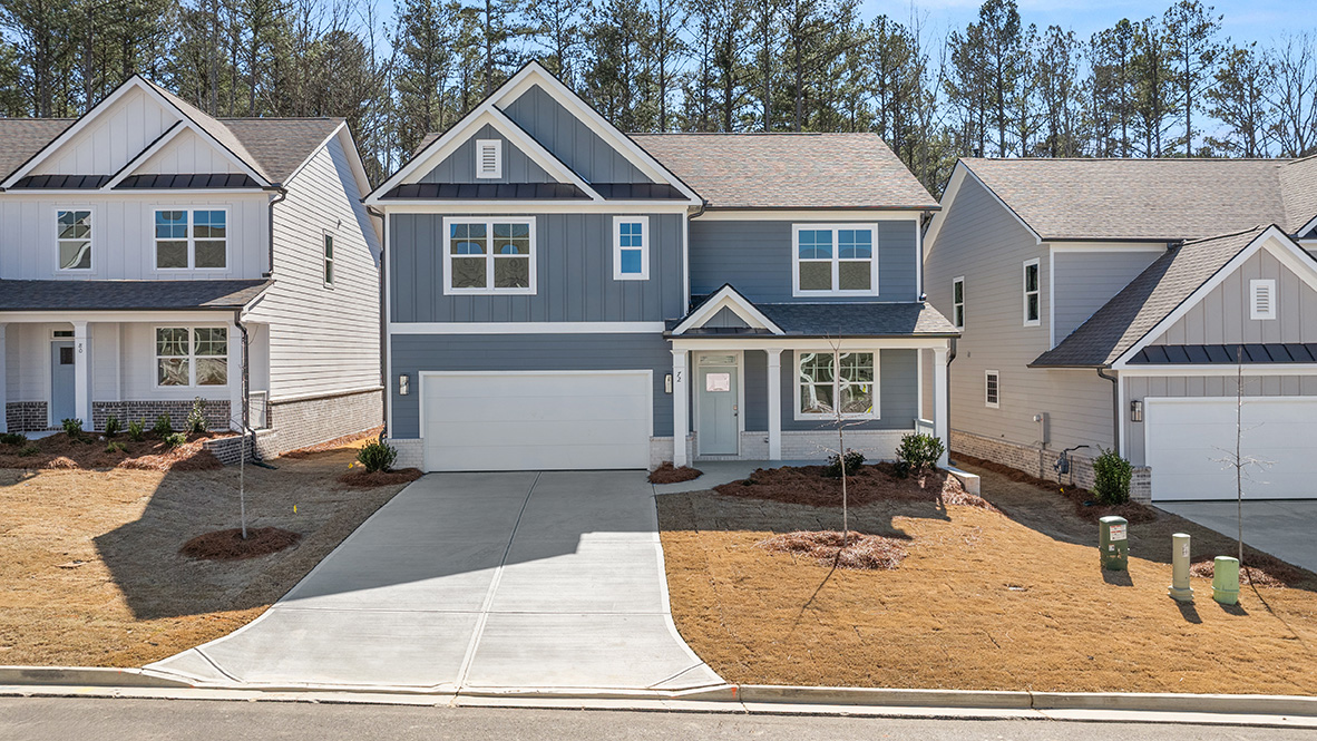 Exterior two-story homes with stone detailing