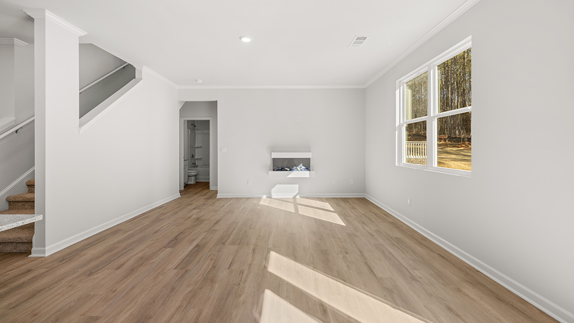 Interior living area with fire place and large windows