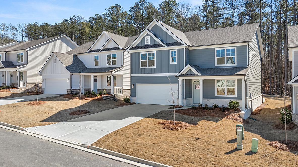 Exterior two-story homes with stone detailing