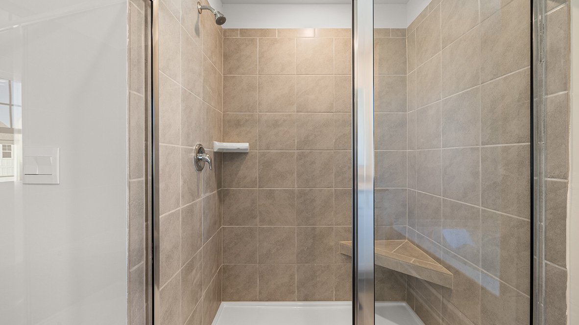 Interior primary bathroom with shower