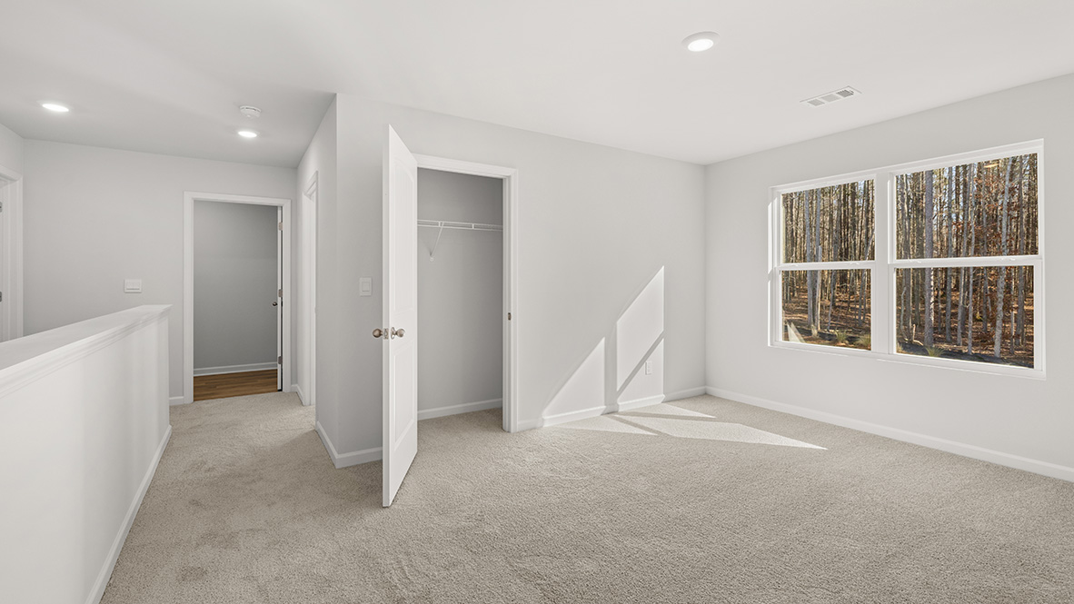 Interior upstairs loft area open to staircase