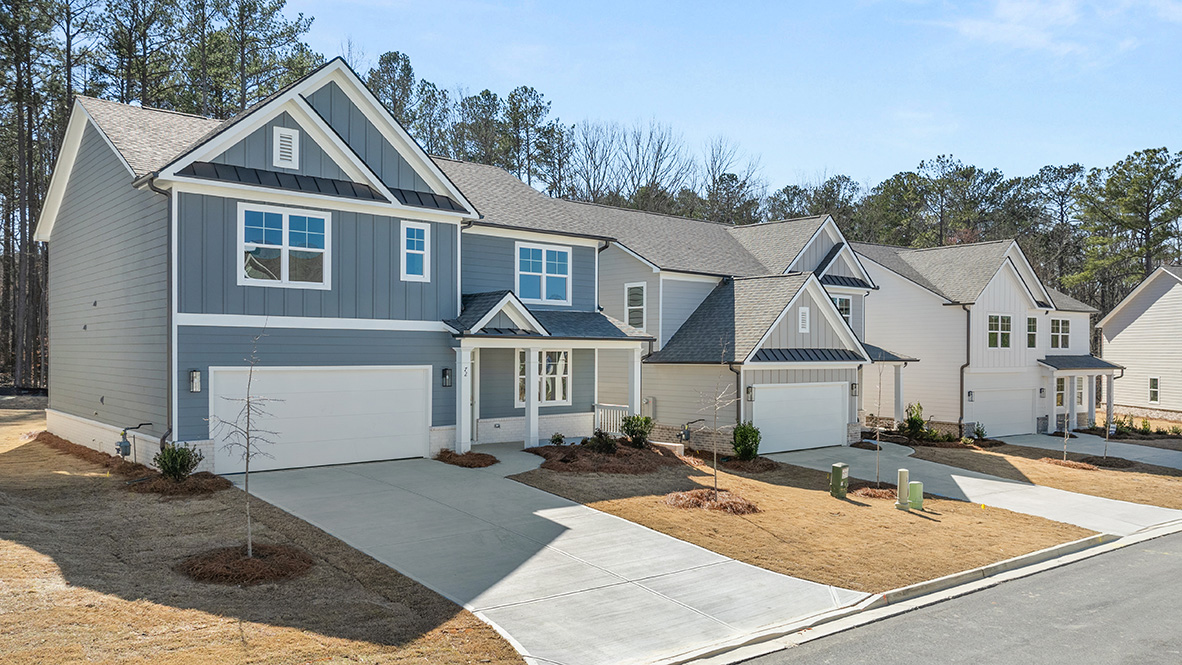 Exterior two-story homes with stone detailing