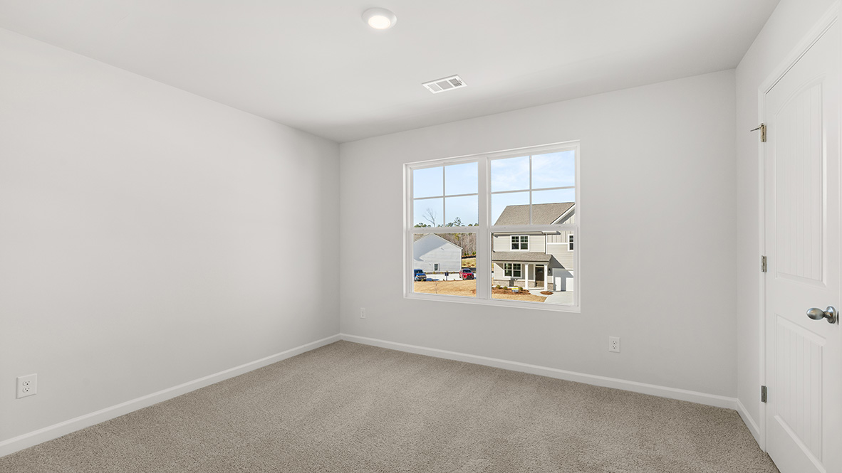 Interior bedroom with large window