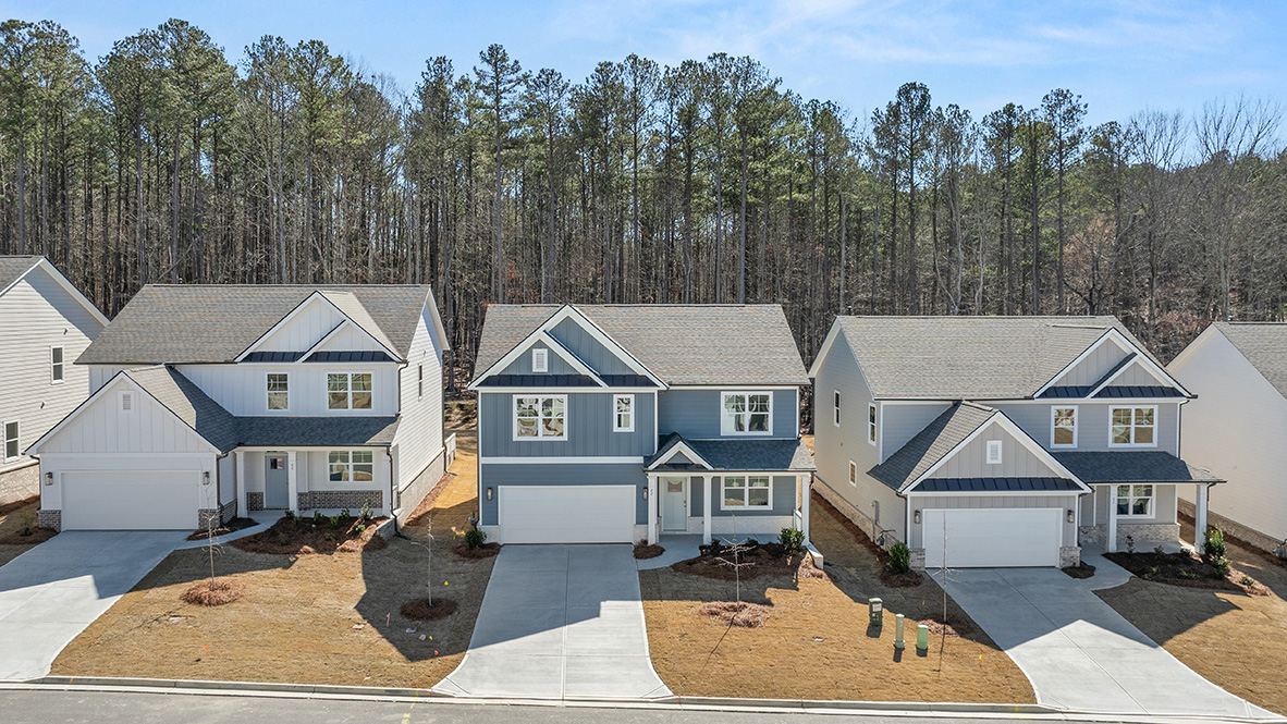 Exterior two-story homes with stone detailing