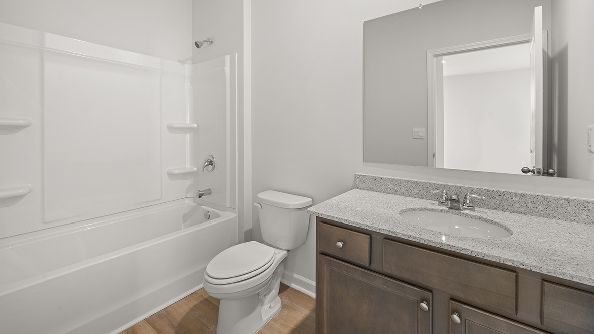 Interior bathroom with sink and full-sized shower