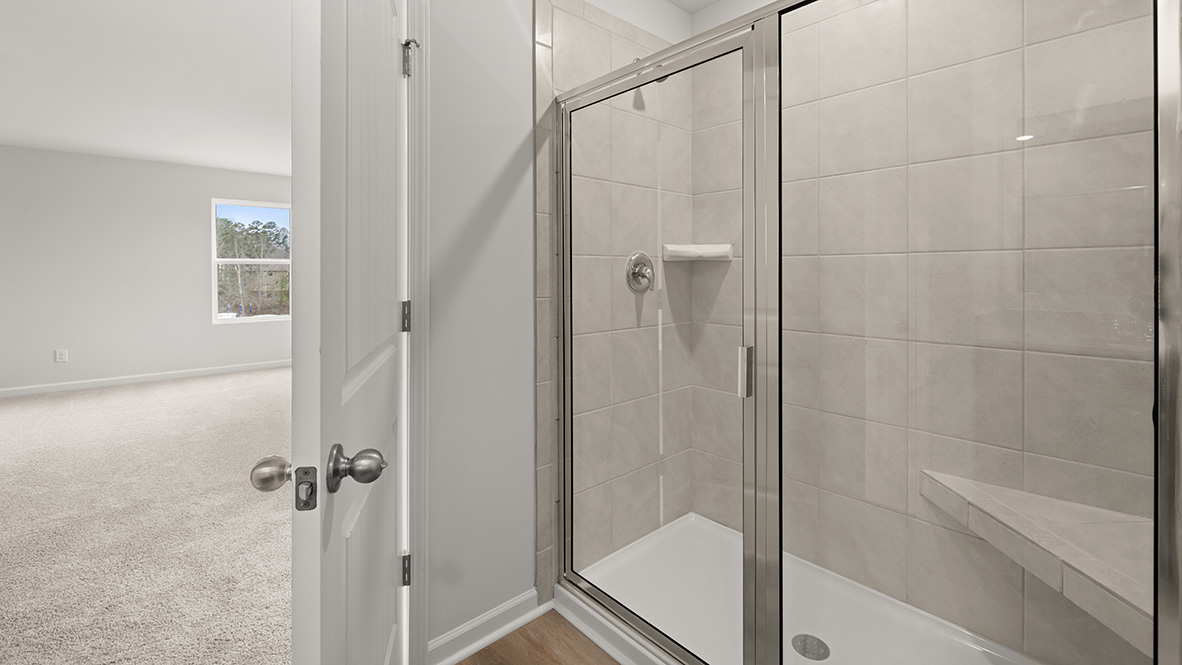 Interior primary bathroom with shower