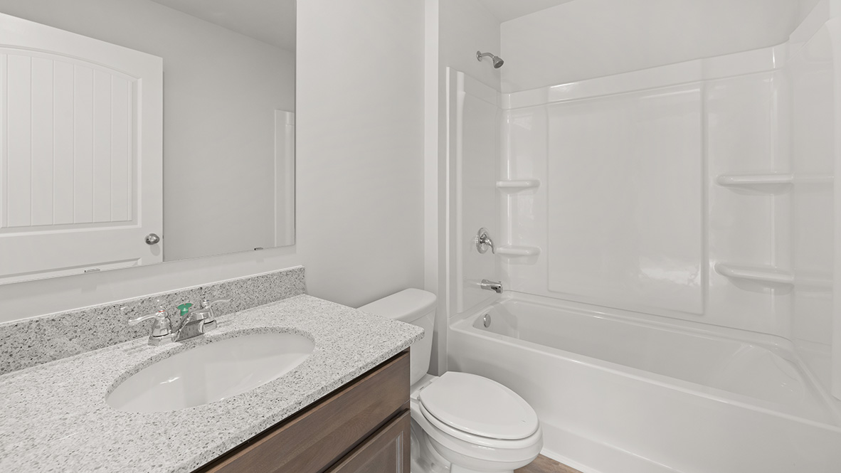 Interior bathroom with sink and full-sized shower