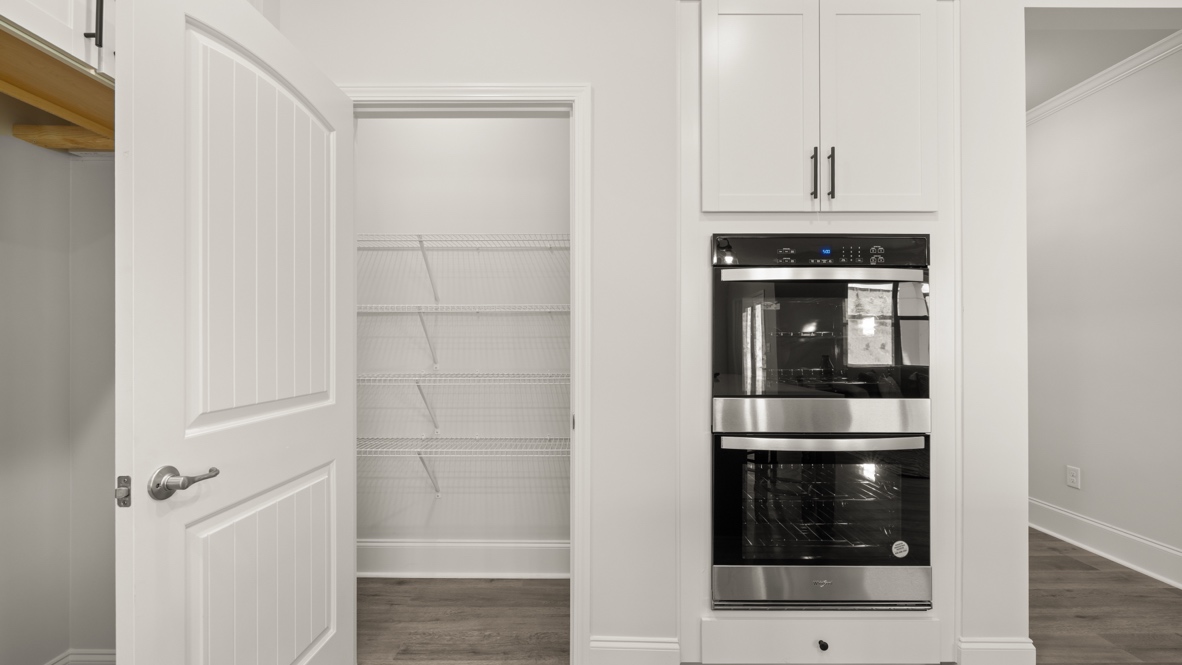 full kitchen with double oven