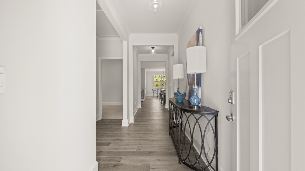 Home entryway hall with white walls.