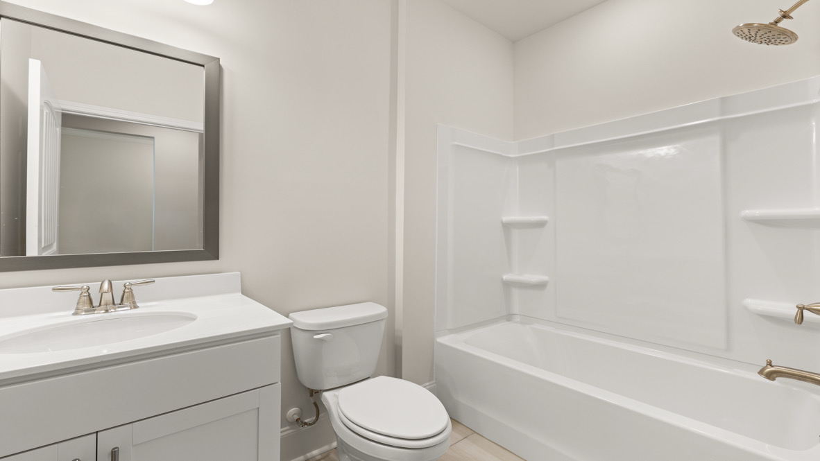 Interior bathroom with sink and full-sized shower