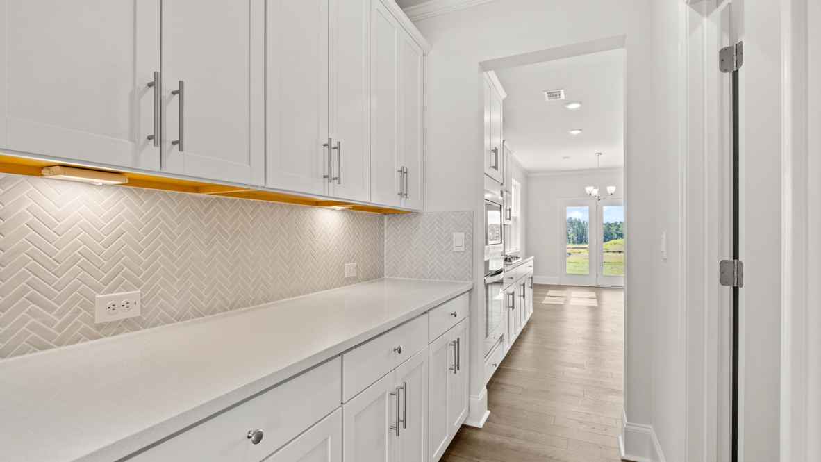 Interior kitchen with white cabinets