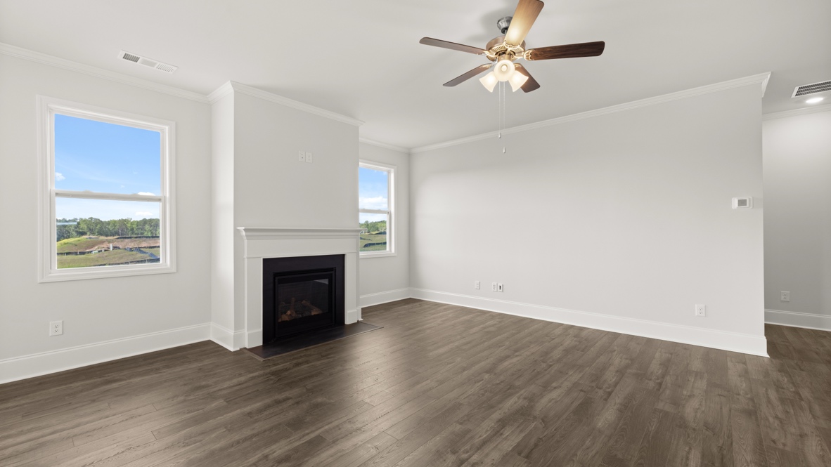 Interior living area with windows and fire place