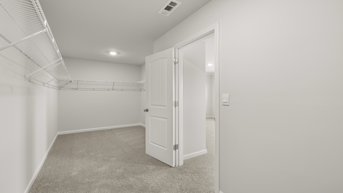 Interior primary walk-in closet