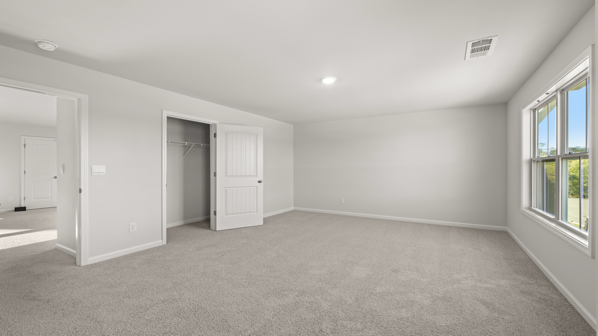 Interior bedroom with large windows