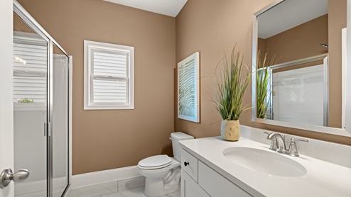 Bathroom with a single vanity sink.