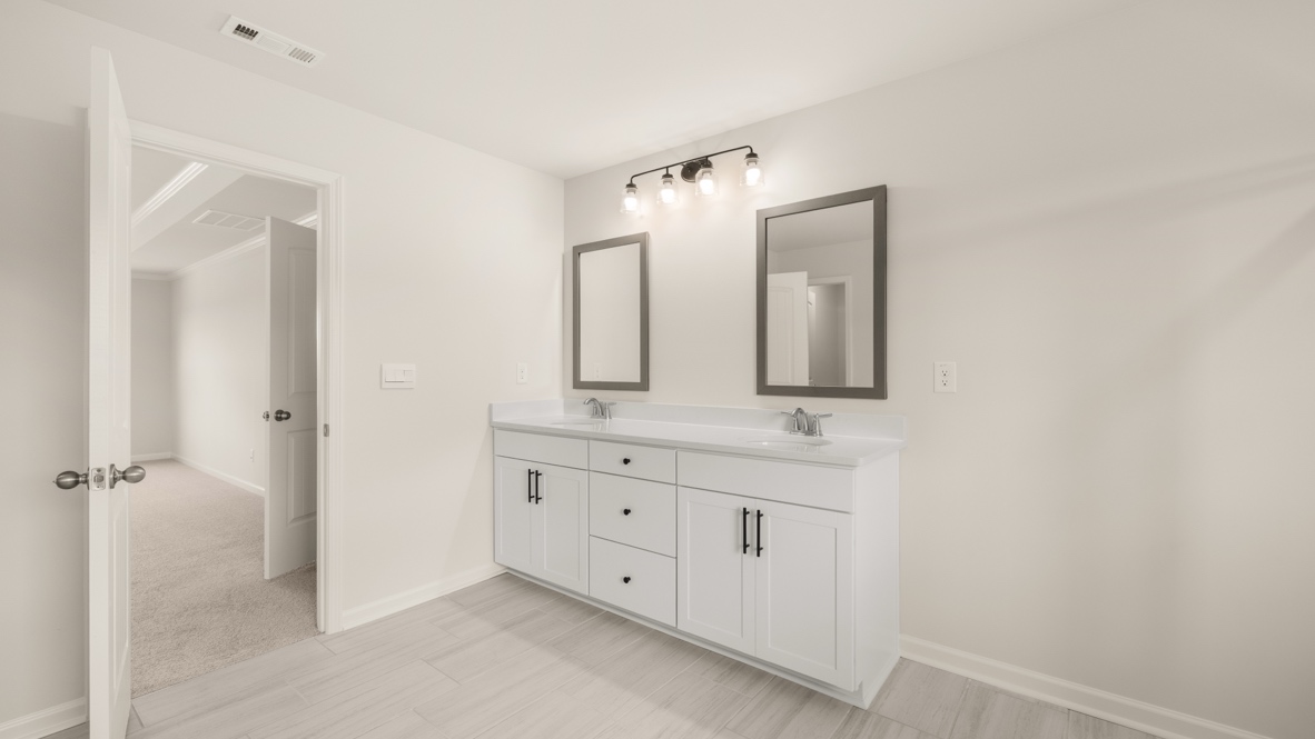 Interior primary bathroom with double sink