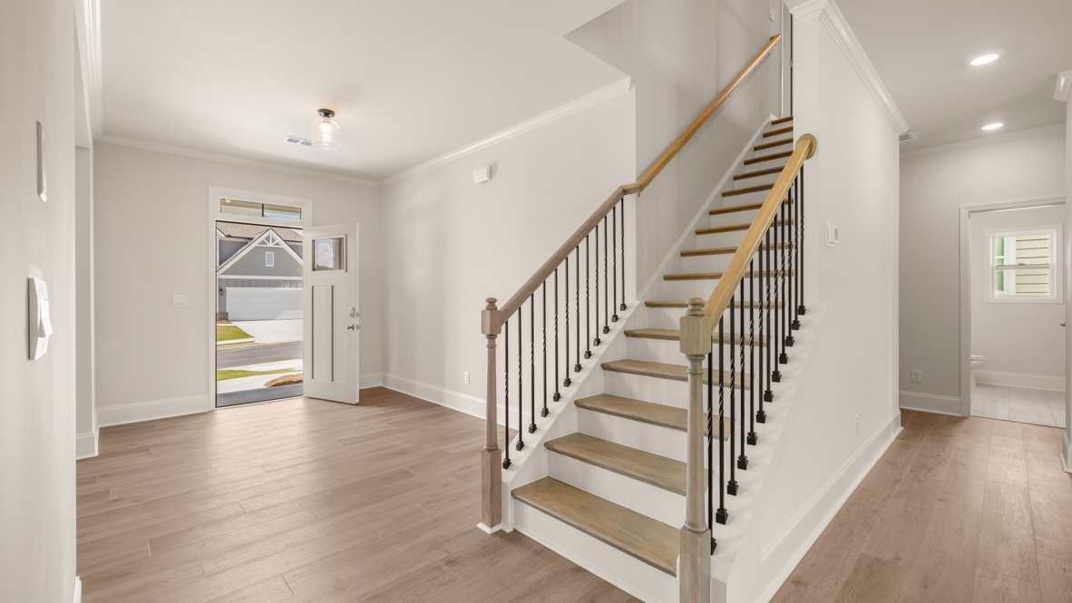 Interior hallway open to staircase