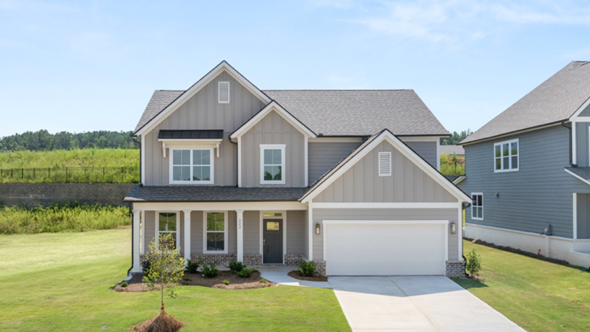 Front exterior of the Lynnbrook floorplan at Hamptons at Riverwood East in Dallas, GA