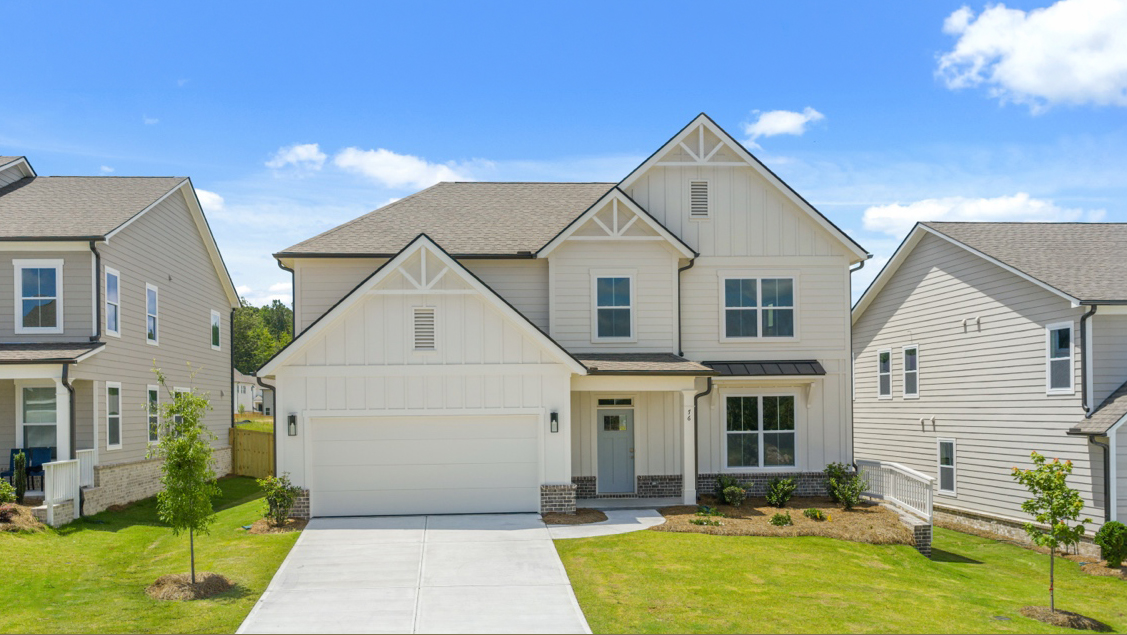 Front exterior of the Lynnbrook floorplan at Hamptons at Riverwood East in Dallas, GA