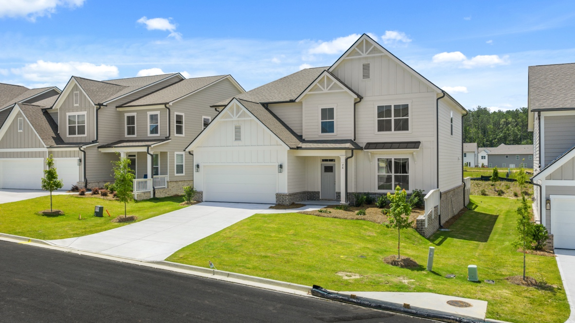 Front exterior of the Lynnbrook floorplan at Hamptons at Riverwood East in Dallas, GA