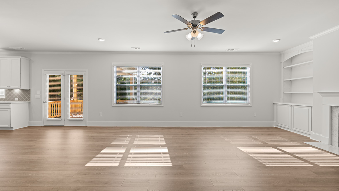 Interior living area with fire place and large windows