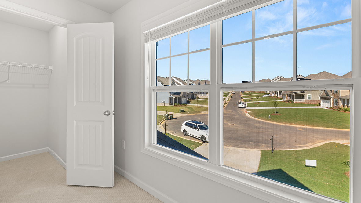 Interior bedroom with large window
