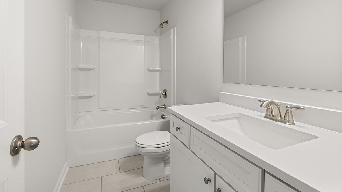 Interior bathroom with sink and full-sized shower