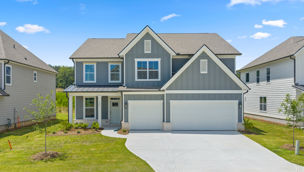 Front exterior of the Westerly floorplan at Hamptons at Riverwood East in Dallas, GA