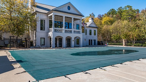 community amenity clubhouse with a pool